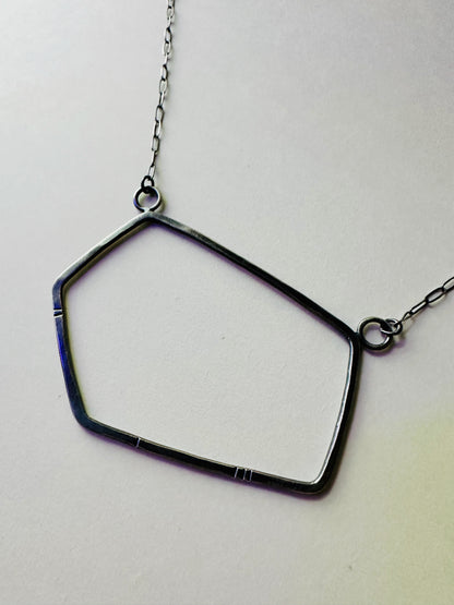 Large geometric necklace