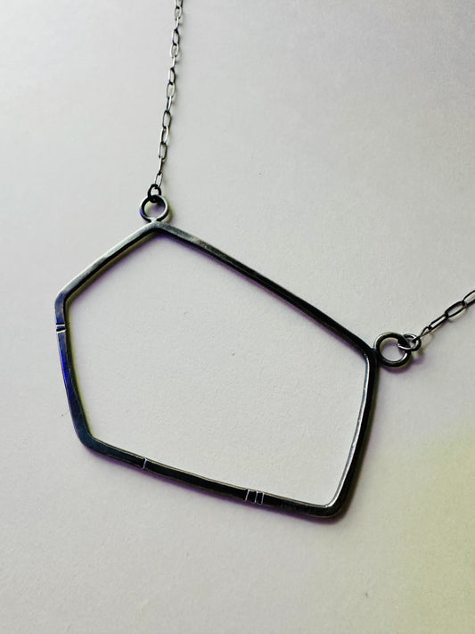 Large geometric necklace