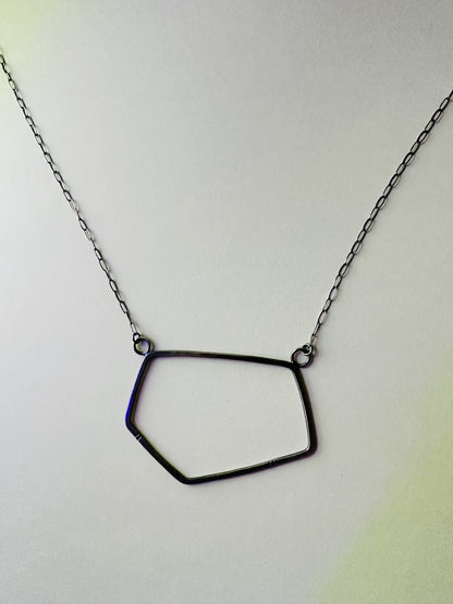 Large geometric necklace